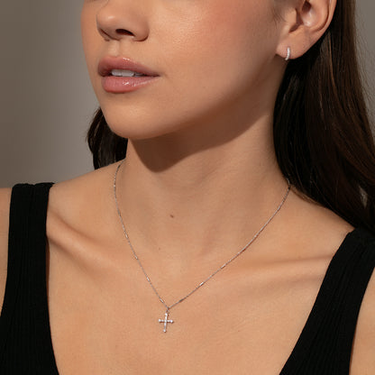 ["Bold Cross Pendant Necklace ", " Sterling Silver ", " Model Image ", " Uncommon James"]