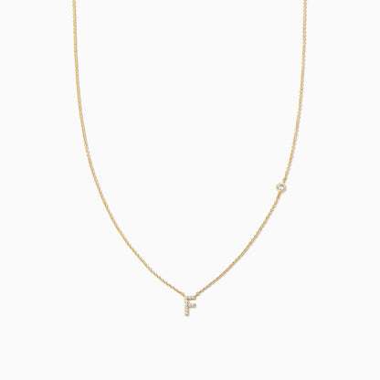 ["Pavé Initial Necklace ", " Gold F ", " Product Image ", " Uncommon James"]