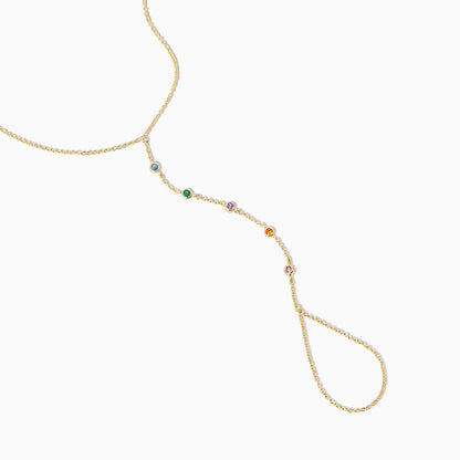 ["Rainbow Gem Hand Chain ", " Gold ", " Product Detail Image ", " Uncommon James"]
