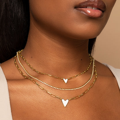 ["White Heart Necklace Small ", " Gold ", " Model Image 2 ", " Uncommon James"]
