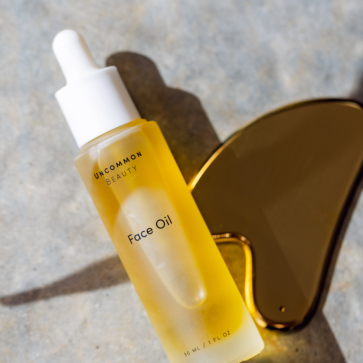 Face Oil and Gua Sha Duo | Lifestyle Image | Uncommon Beauty