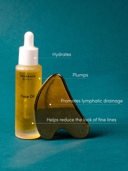 Face Oil and Gua Sha Duo | Product Image | Uncommon Beauty | 1. Hydrates 2. Promotes lymphatic drainage 3. Helps reduce the look of fine lines 4. Plums