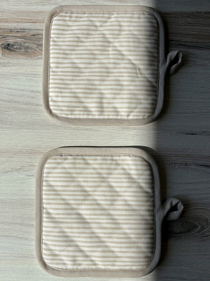 ["Tan Striped Pot Holder (Set of 2) ", " Lifestyle Image 3 ", " Uncommon Lifestyle"]