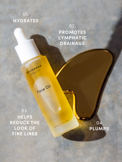 ["Face Oil and Gua Sha Duo ", " Product Detail Image ", " Uncommon Beauty"]