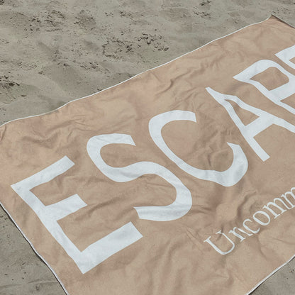 ["Escape Beach Towel ", " Lifestyle Image ", " Uncommon James Home"]