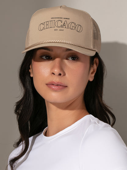 ["Chicago Trucker Hat ", " Beige ", " Model Image 2 ", " Uncommon Lifestyle"]