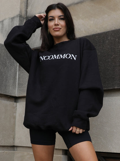 ["Uncommon Sweatshirt ", " Black ", " Model Image ", " Uncommon James"]