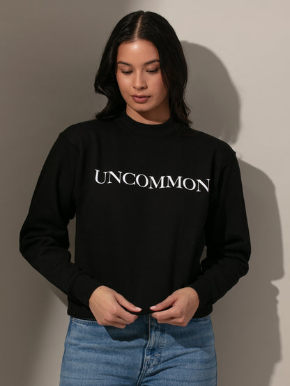 ["Uncommon Sweatshirt ", " Black ", " Model Image 2 ", " Uncommon James"]