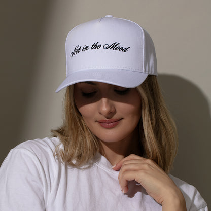 ["Not in the Mood Trucker Hat ", " White ", " Model Image 2 ", " Uncommon Lifestyle"]