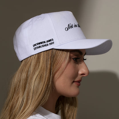 ["Not in the Mood Trucker Hat ", " White ", " Model Image 3 ", " Uncommon Lifestyle"]