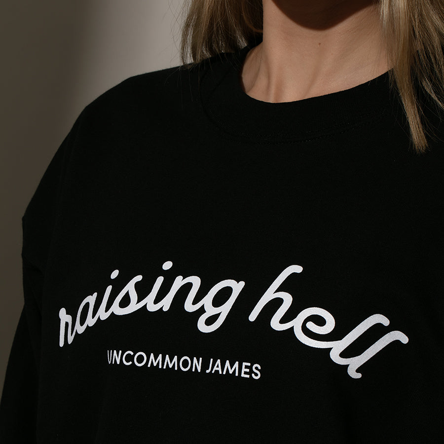 Raising Hell Sweatshirt | Black | Model Image 3 | Uncommon Lifestyle