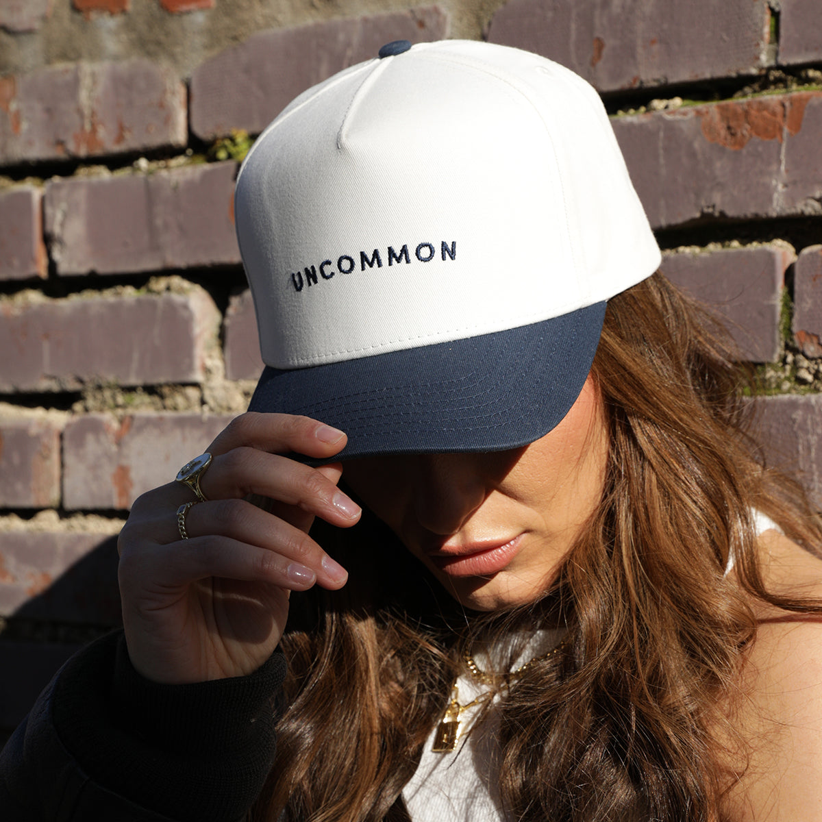 Simple Uncommon Trucker Hat | Navy/White | Model Image | Uncommon Lifestyle