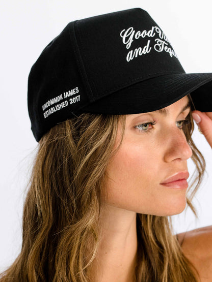 ["Tequila Vibes Trucker Hat ", " Black ", " Model Image 2 ", " Uncommon Lifestyle"]