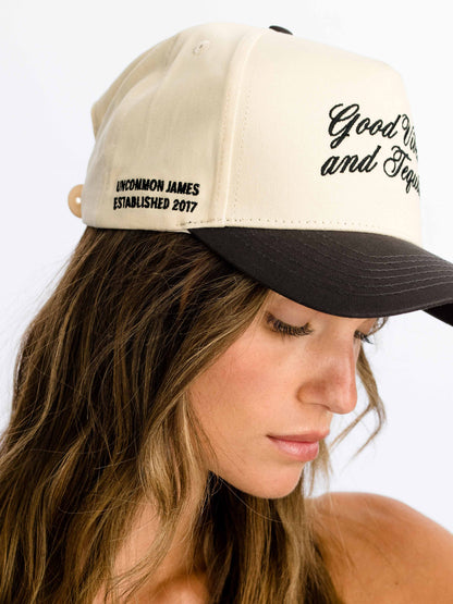 ["Tequila Vibes Trucker Hat ", " Charcoal/Tan ", " Model Image ", " Uncommon Lifestyle"]