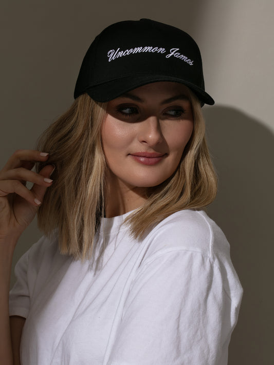 UJ Girl Trucker Hat | Black | Model Image 2 | Uncommon Lifestyle