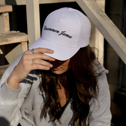 UJ Girl Trucker Hat | White | Model Image | Uncommon Lifestyle