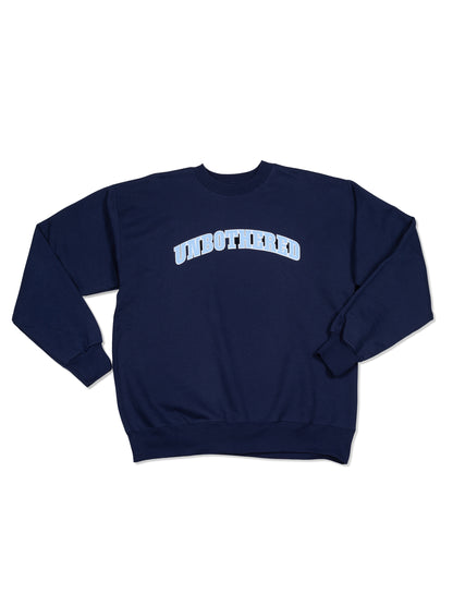 ["Unbothered Sweatshirt ", " Navy ", " Product Image ", " Uncommon Lifestyle"]