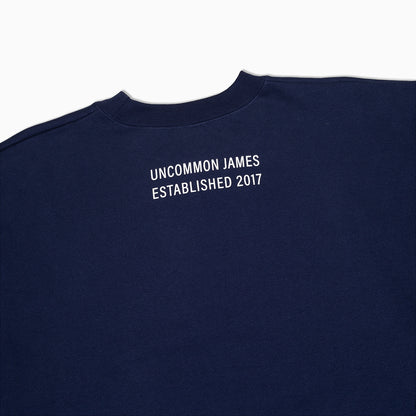 ["Unbothered Sweatshirt ", " Navy ", " Product Detail Image 2 ", " Uncommon Lifestyle"]