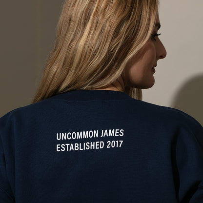 ["Unbothered Sweatshirt ", " Navy ", " Model Image 4 ", " Uncommon Lifestyle"]