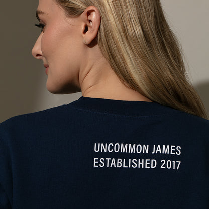 ["Unbothered Sweatshirt ", " Navy ", " Model Image 5 ", " Uncommon Lifestyle"]