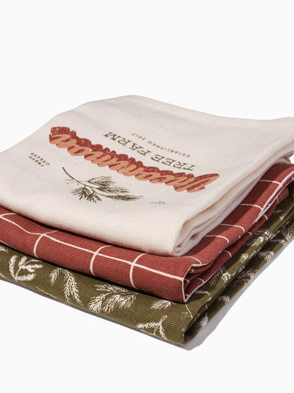 ["Tree Farm Dish Towels (Set of 3) ", " Lifestyle Image ", "  Uncommon Lifestyle"]