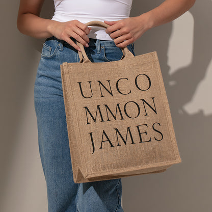 ["UJ Jute Tote Bag ", " Model Image ", " Uncommon James Home"]