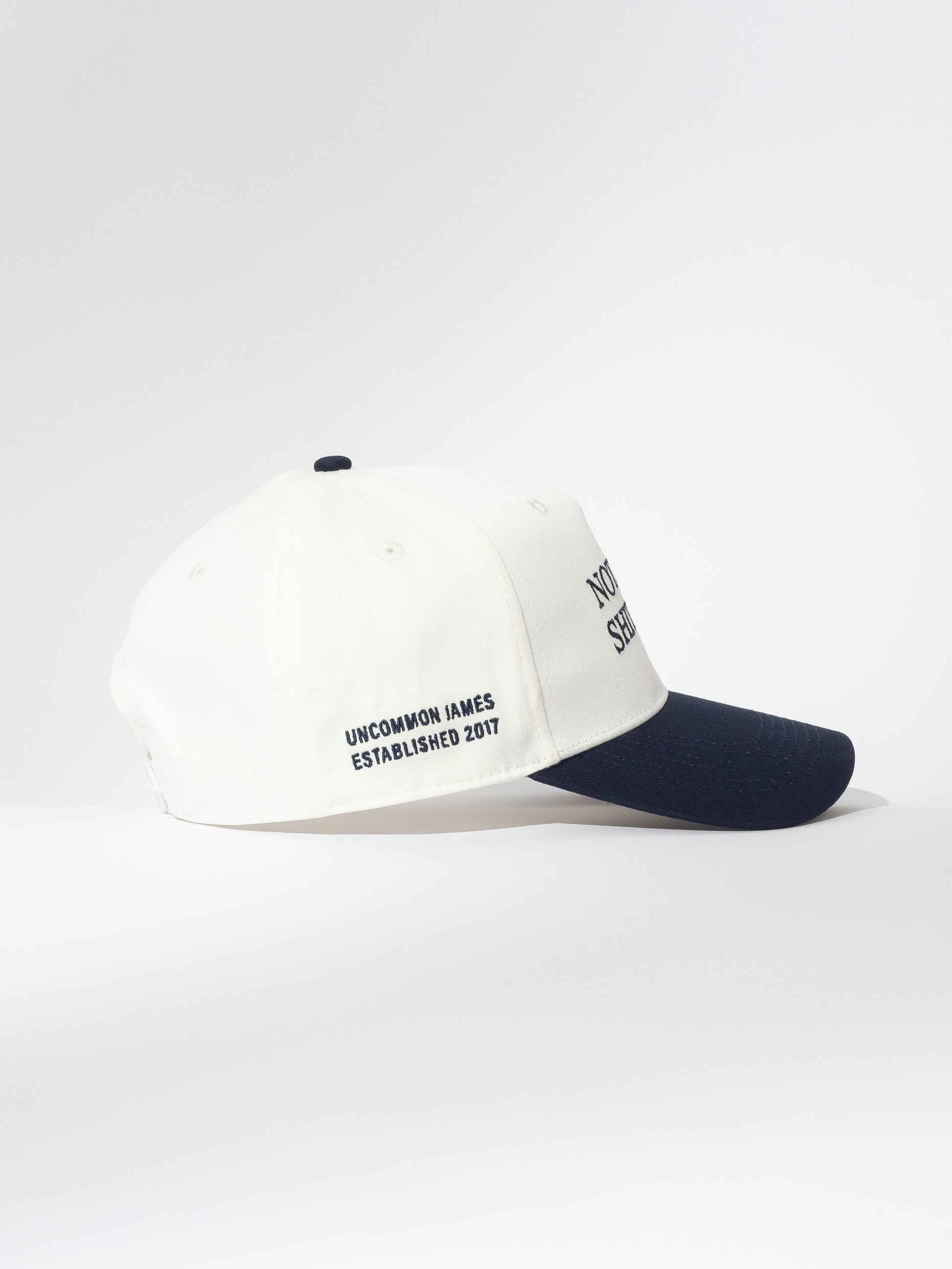 Day Off Trucker Hat | White and Navy | Product Image | Uncommon Lifestyle 