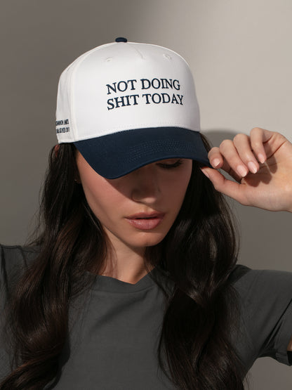 Day Off Trucker Hat | White and Navy | Model Image | Uncommon Lifestyle 