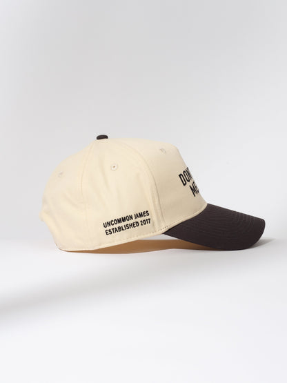 ["Don't Call Me Baby Trucker Hat ", " Ivory/Black ", " Product Image 2 ", " Uncommon Lifestyle"]