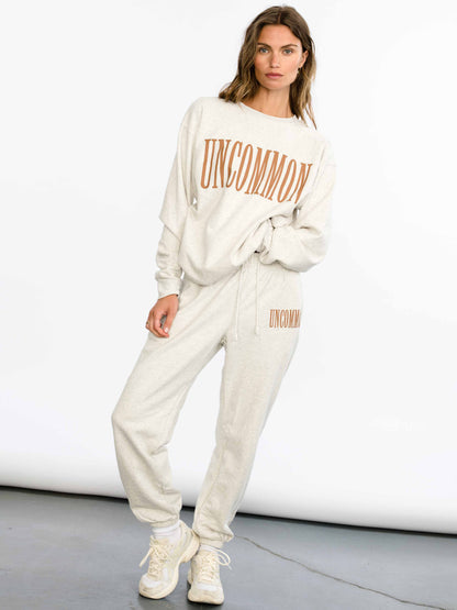 ["Forever Uncommon Sweatshirt ", "  Brown ", " Model Image ", " Uncommon Lifestyle"]