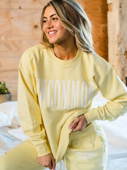 ["Forever Uncommon Sweatshirt ", "  Yellow ", " Campaign Image ", " Uncommon Lifestyle"]