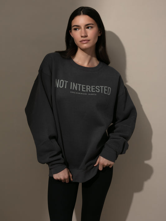 Not Interested Crewneck Sweatshirt | Dark Gray | Model Image | Uncommon Lifestyle