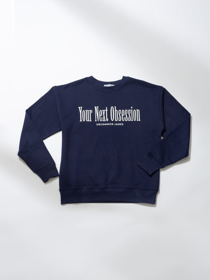 ["Obsessed Sweatshirt ", " Navy ", " Product Image ", " Uncommon Lifestyle"]