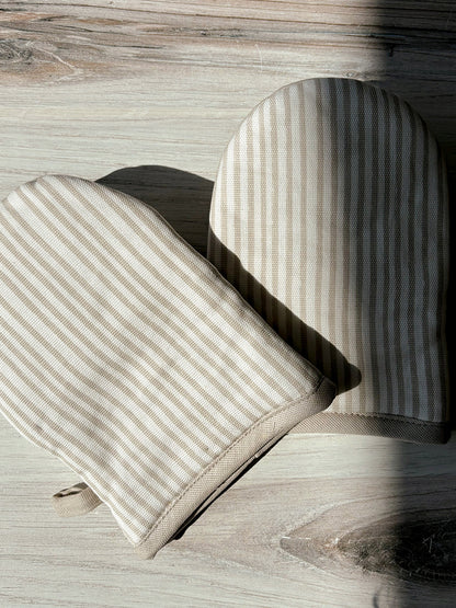 ["Tan Striped Mini Oven Mitt (Set of 2) ", " Lifestyle Image ", " Uncommon Lifestyle"]