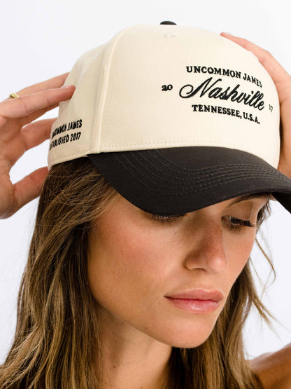 ["City Girl Nashville Trucker Hat ", " Charcoal/Tan ", " Model Image ", " Uncommon Lifestyle"]