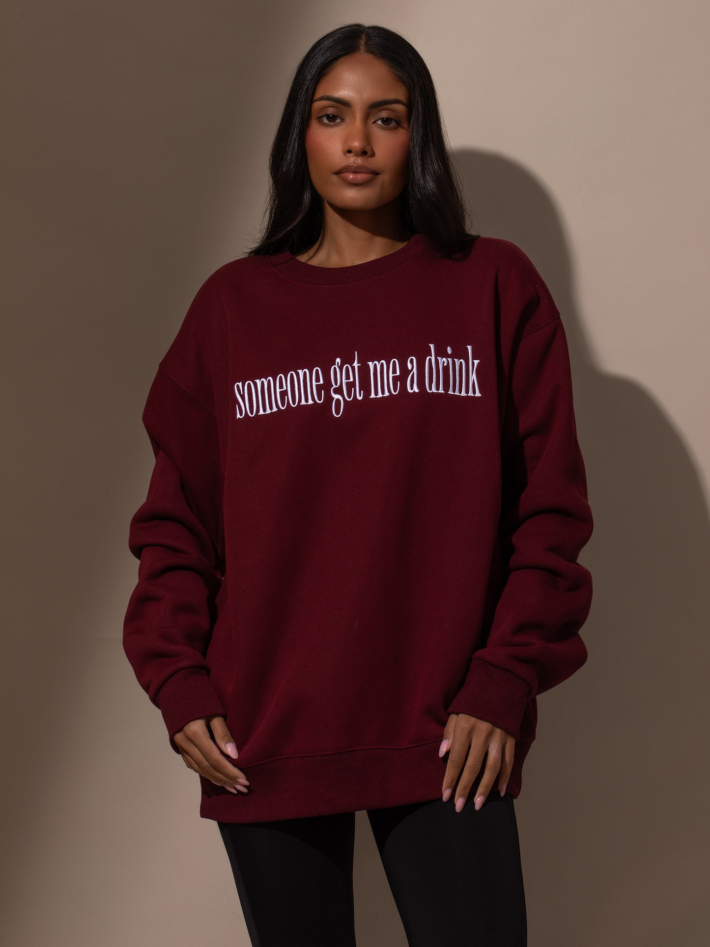 Need a Drink Sweatshirt | Burgundy | Model Image | Uncommon Lifestyle