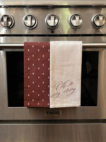 ["Merry Dish Towel (Set of 2) ", " Lifestyle Image ", " Uncommon Lifestyle "]