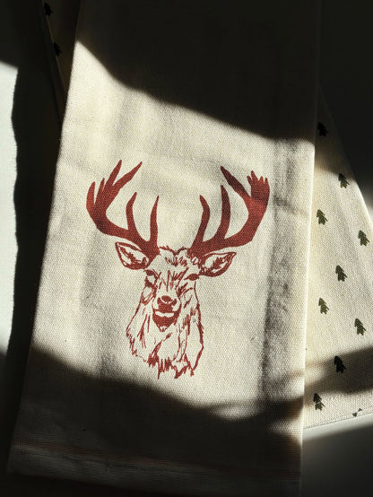 ["Winter Buck Dish Towel (Set of 2) ", " Lifestyle Image ", " Uncommon Lifestyle "]