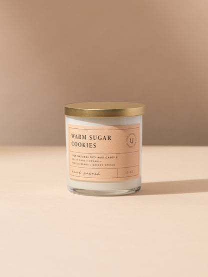 ["Warm Sugar Cookies Candle ", " 10 OZ ", " Product Image ", " Uncommon Lifestyle"]