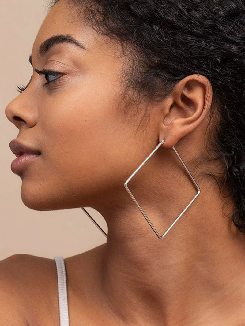 Girl Boss Hoop Earrings | Silver Large | Model Image | Uncommon James