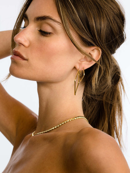 ["Girl Boss Hoop Earrings ", " Gold Medium ", " Model Image ", " Uncommon James"]