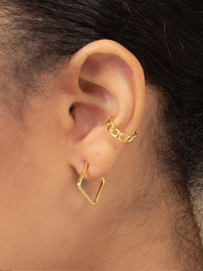 ["Girl Boss Hoop Earrings ", " Gold Huggies ", " Model Image ", " Uncommon James"]