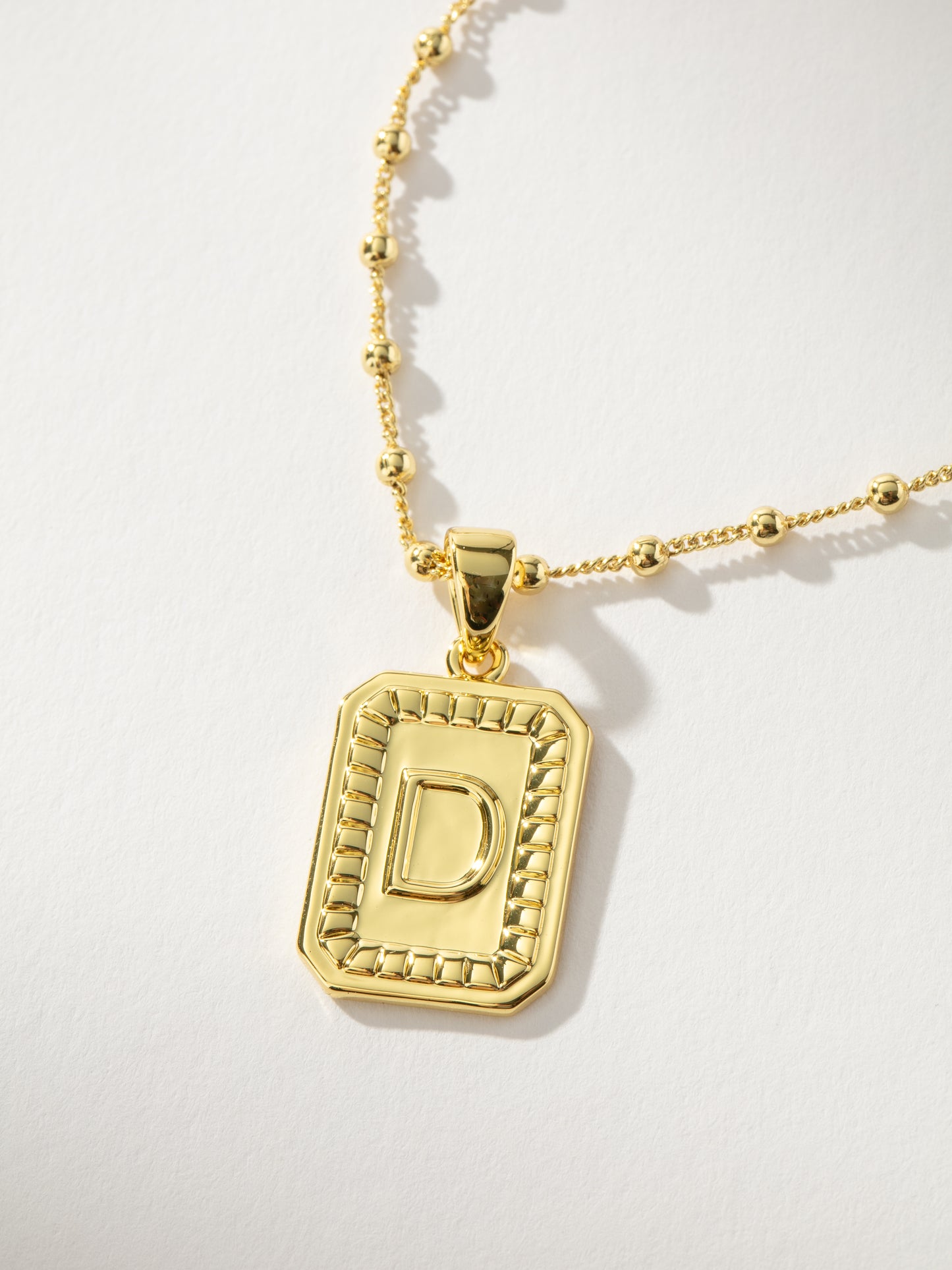 Sur Necklace | Gold D | Product Image | Uncommon James