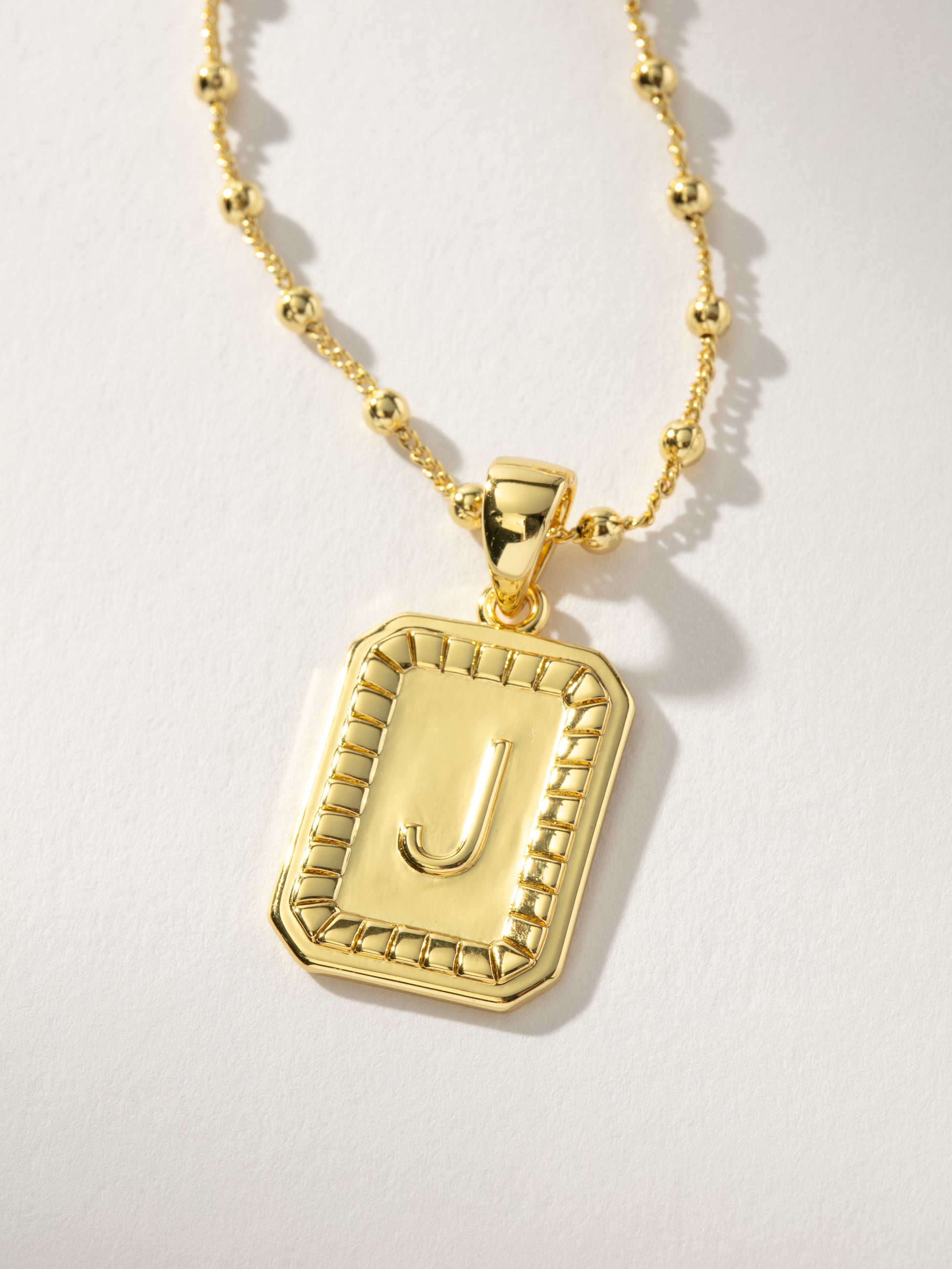Sur Necklace | Gold J | Product Image | Uncommon James