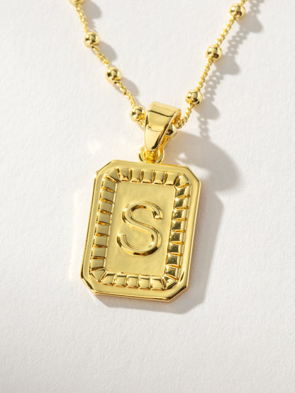 ["Sur Necklace ", " Gold S ", " Product Image ", " Uncommon James"]