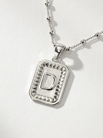 ["Sur Necklace ", " Silver D ", " Product Image ", " Uncommon James"]