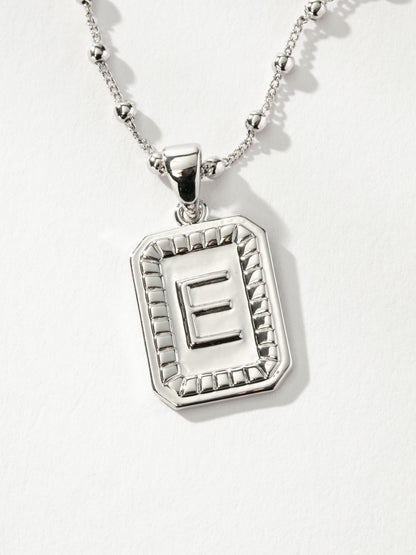 ["Sur Necklace ", " Silver E ", " Product Image ", " Uncommon James"]