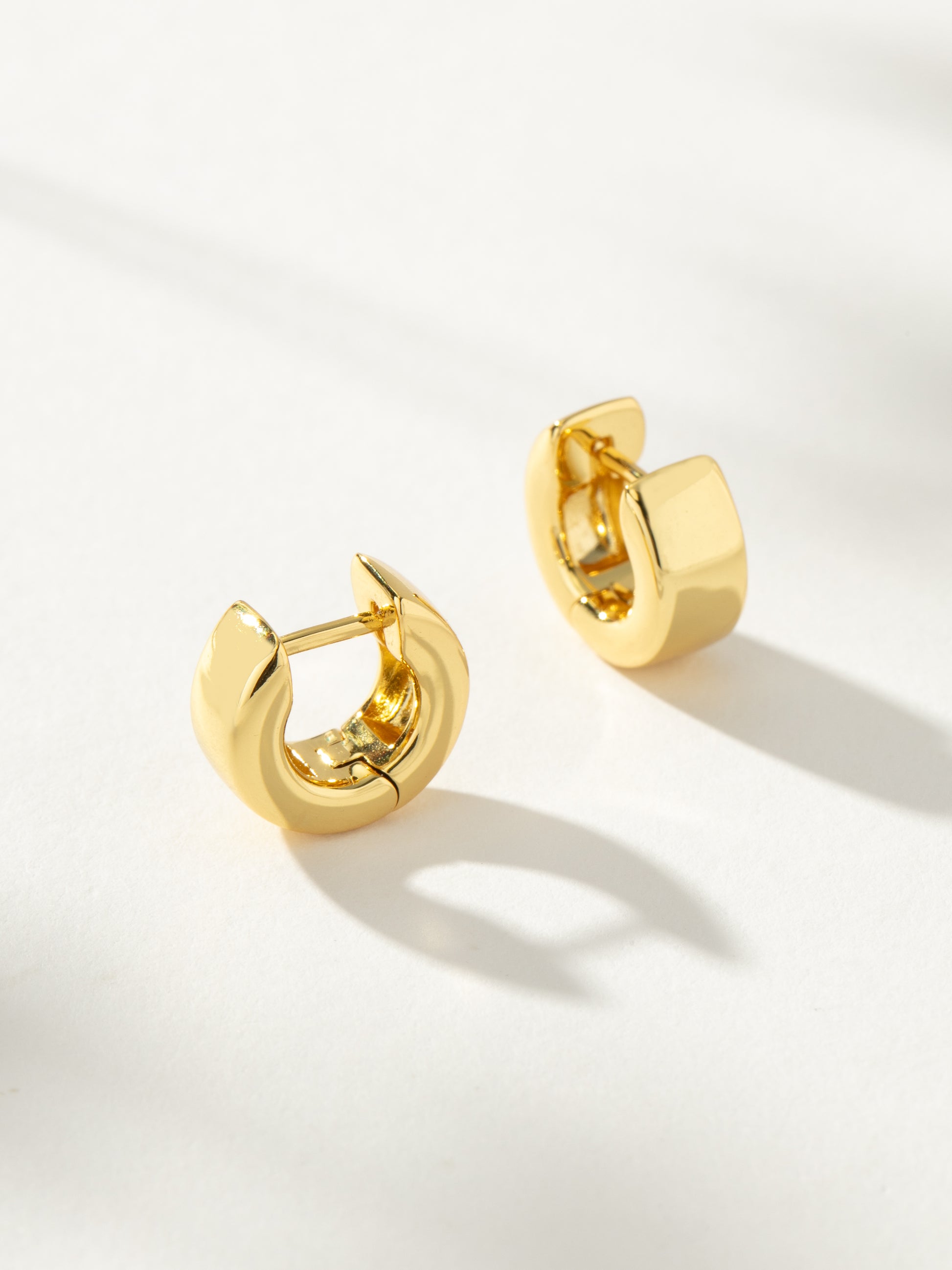 Little Thick Hoop Huggie Earrings in Gold | Uncommon James