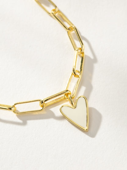 ["White Heart Bracelet ", " Gold ", " Product Detail Image ", " Uncommon James"]