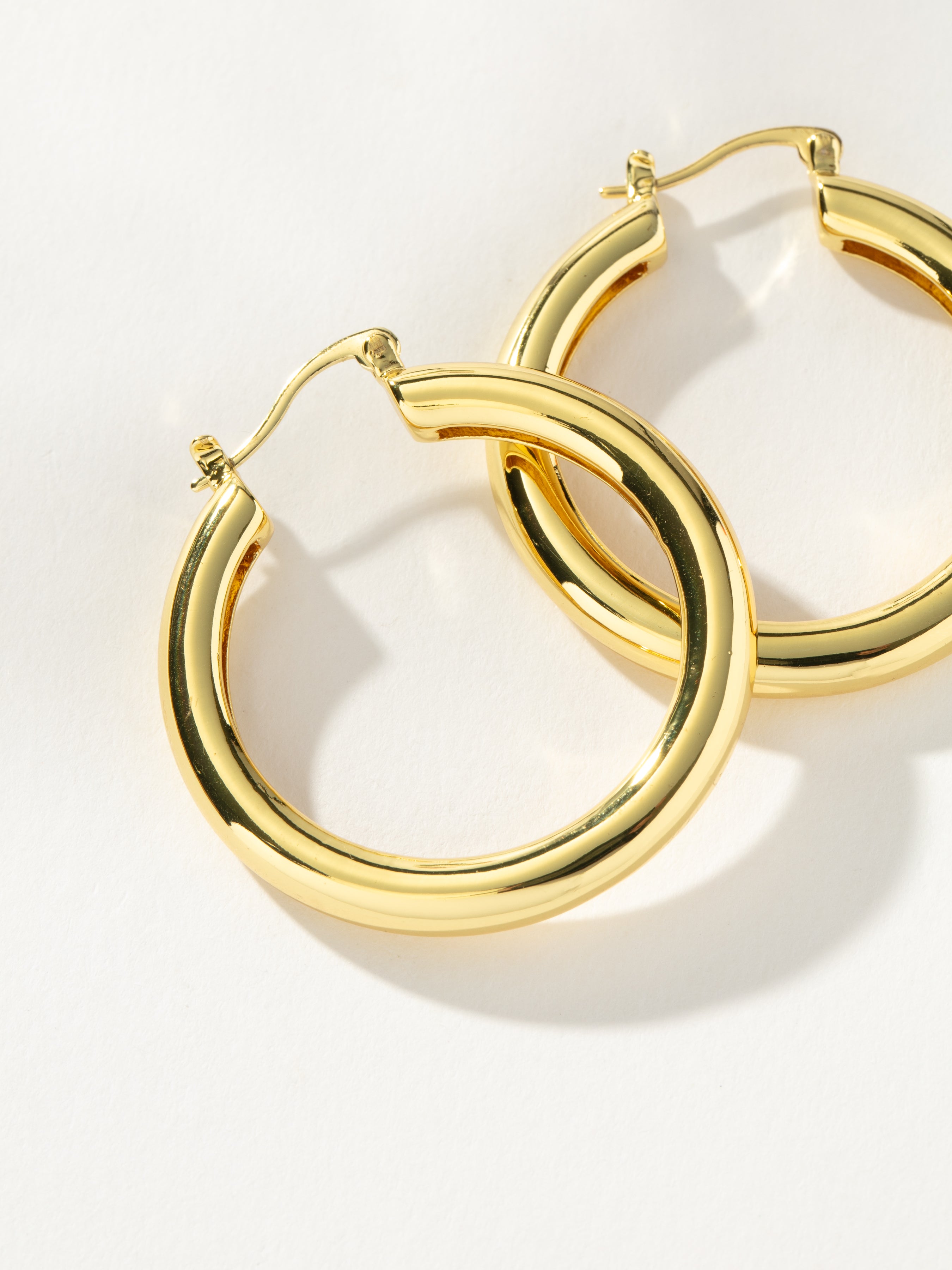 Gold staple earrings store